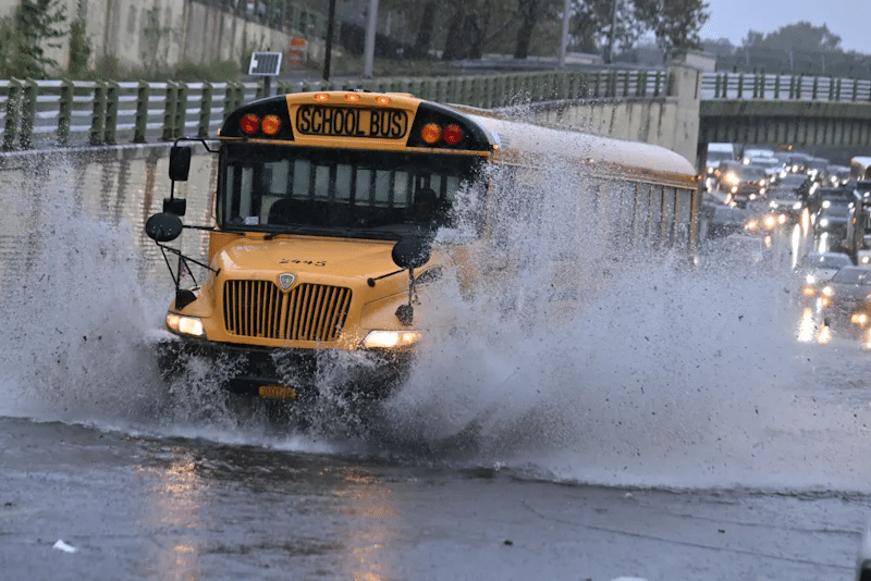 NYC streets turn into raging rivers during epic downpour flooding roads ...